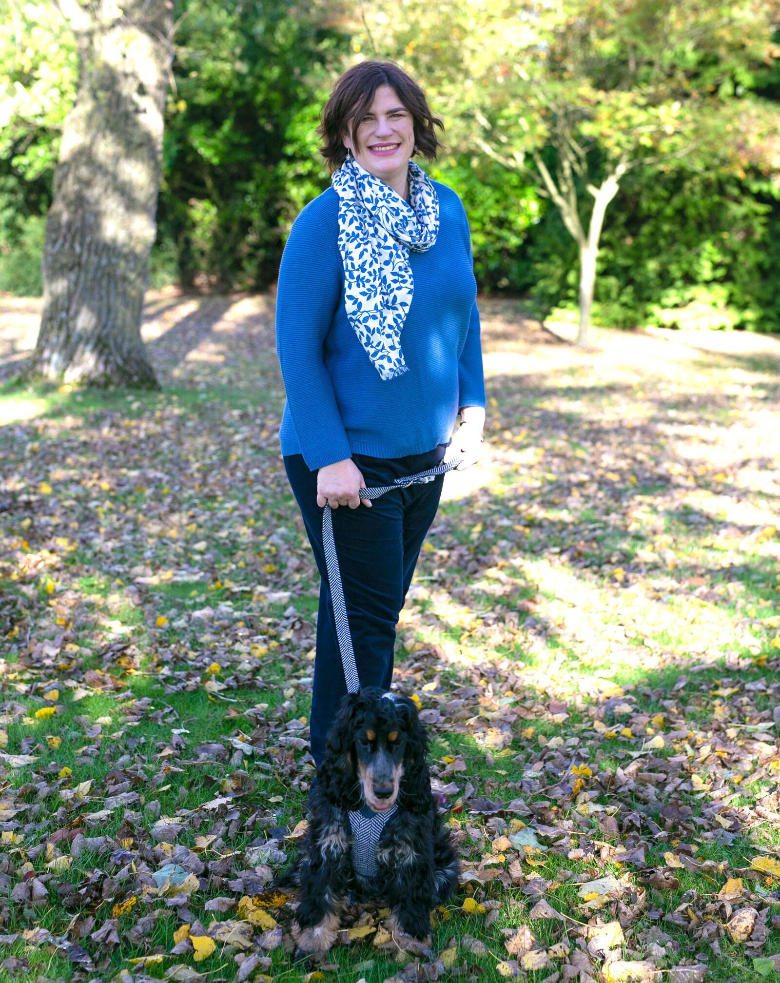 blue jumper Dustin Louise Dillon and cocker spaniel